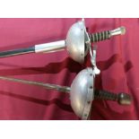 Pair of reenactors style Rapier swords with cut basket hilts and scabbards, the tri-form blades