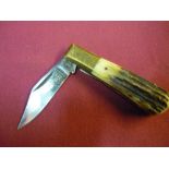 Single bladed pocket knife by T. W. Ablett of Sheffield with two piece antler grips and brass mounts