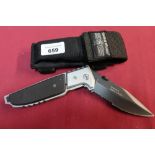 As new ex shop stock Smith and Wesson extreme ops pouch knife with 4" folding blackened blade