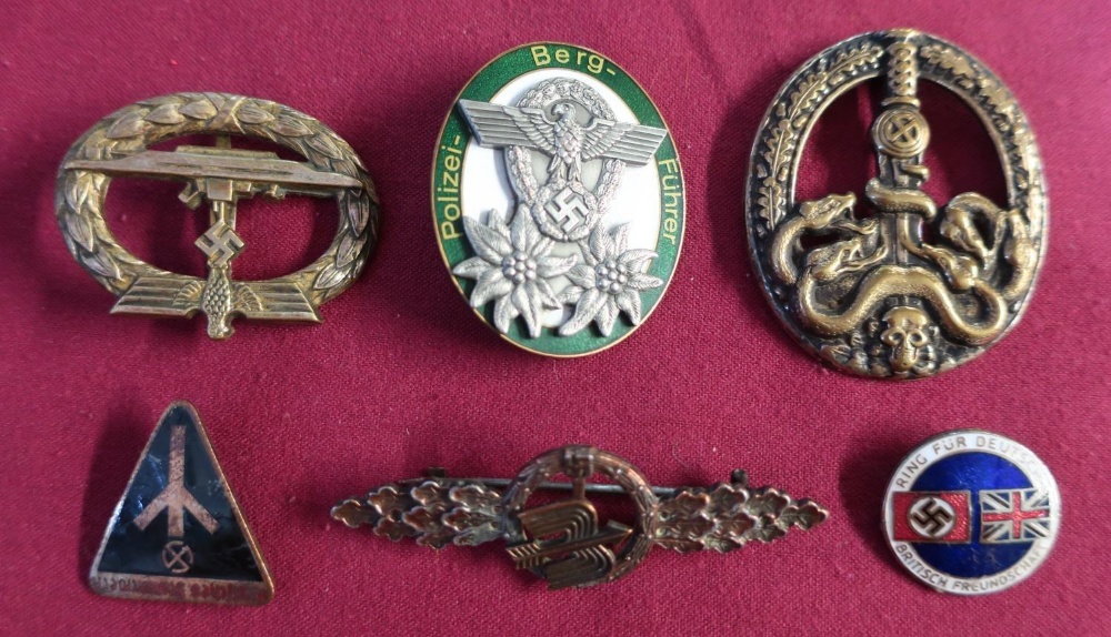 Selection of German military and other badges including an enamel British Union of Fascist, a