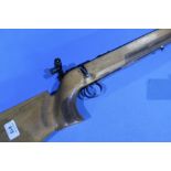 .22 Vostock bolt action target rifle with aperture rear sight and tunnel foresight, serial no. M-