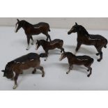 Five Beswick models of foals, one grazing (5)