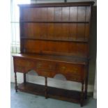 Georgian style oak dresser twin shelved back with shaped cornice, three long and three short drawers