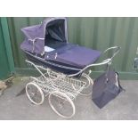 Silver Cross childs pram, blue body on chrome folding base, with cover, net, bag and rack