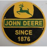 Painted cast metal John Deere circular sign (diameter 24cm)