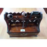 Edwardian walnut pipe rack raised back, and single drawer with brass handle (30cm x 23cm x 12cm)