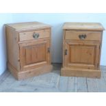 Pair of waxed pine bedside cabinets with single drawer above panelled door, on skirted base (46cm
