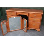 Younger furniture kneehole dressing table on bracket feet (133cm x 56cm x 69cm) and a triple