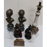 Two 19th century cast brass female busts on green marble plinths, a Rococo style candle stick, a