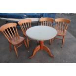 Pine pedestal café table and four chairs