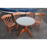 Pine pedestal café table and four chairs