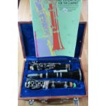 Lark M4001 clarinet in fitted case, and a clarinet tunes book