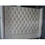5ft bedstead upholstered in oatmeal material with studded and deeply buttoned backed headboard
