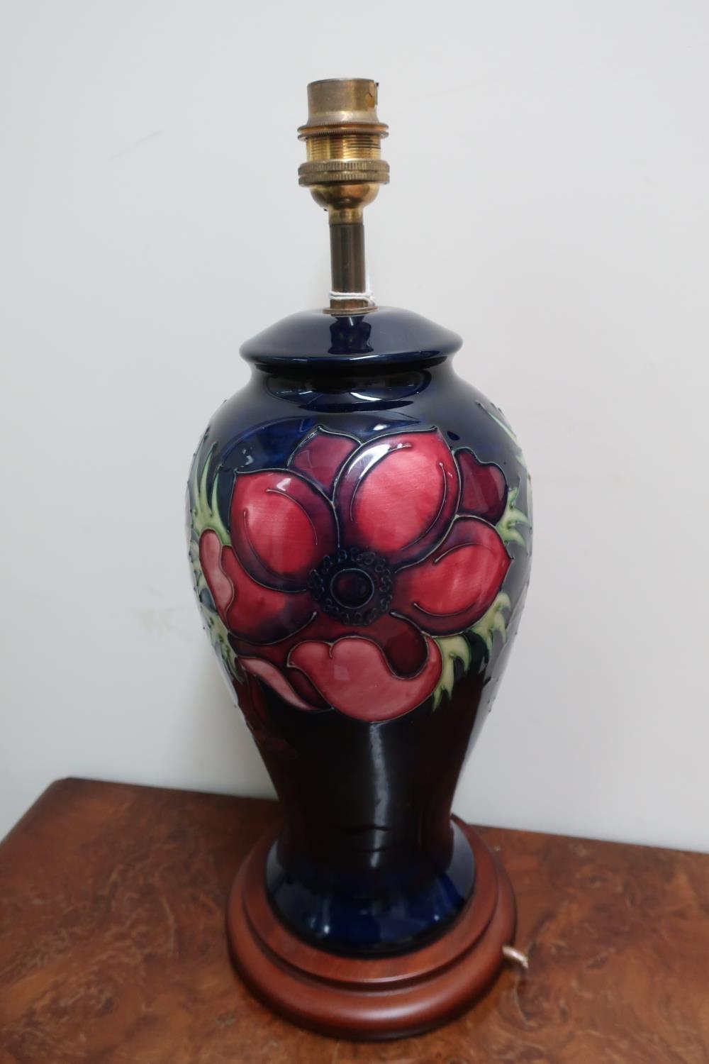 Moorcroft Anemone pattern baluster table lamp, on wooden base, (37cm high max)