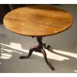 Late 19th C oak tripod table, circular top on baluster column and three splay legs (diameter 89cm,