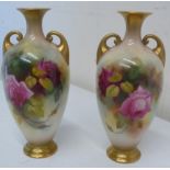 Pair of Royal Worcester vases, ovoid bodies painted with roses, gilt handles and base, shape 284, (