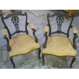 Pair of late Victorian mahogany salon chairs with carved crested rail, pierced and carved vase