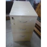 Office three drawer filing cabinet in light wood finish