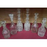 Pair of late Victorian cut glass claret decanters with faceted tops, and four other decanters (6)