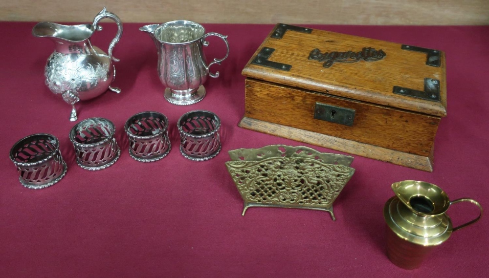 Early 20th C golden oak cigarette box with plated mounts, four plated napkin rings and two similar