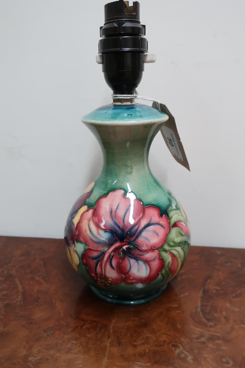 Moorcroft Hibiscus pattern mallet shaped table lamp, with impressed mark and part of old label, (