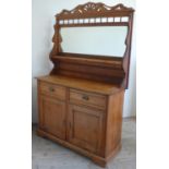 Victorian pine mirror back sideboard with galleried top above two drawers and two panel doors, on