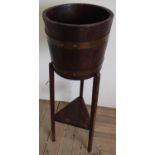R. A. Lister & Co Ltd copper bound coopered oak jardinière, square tapered supports joined by