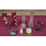 Pair of cranberry trumpet design vases with painted floral decoration, posy vases, two other posy