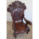 Chinese throne chair, arched back carved with three toed dragon in panel, carved arms and serpentine