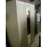 Contemporary magnolia finish wardrobe, central mirror door flanked by panel doors (200cm x 135cm x
