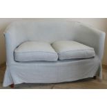 Small modern two seat curved back sofa, with loose grey cover and two seat cushions (122cm x 73cm
