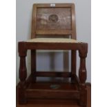 Yorkshire oak childs chair, panel back carved with a Yorkshire rose, brass nail upholstered seat, on