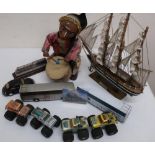 Late 1960s Alps battery operated toy of a Indian playing a drum, wooden model of a three masted