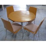 Julian Bowen 1960s style dining table with circular top on chromed pedestal and four bent formed