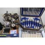 Collection of EPNS ware including set of four goblets, boxed and other cutlery, coasters etc, in two