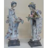 Pair of large Lladro figures of Japanese females with trays of flowers, (H34cm) (2)