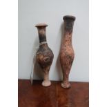 Two Antique Roman pottery tear catchers (H16cm)