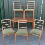 Five McIntosh furniture Dunvegan teak dining chairs, incl. two elbow chairs, and an extending dining