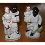 Unusual pair of 19th C Staffordshire figures, modelled as mixed race children and adult figures (