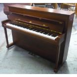 Kemble of London mahogany cased upright piano, iron over strung, framed and numbered 268127 supplied