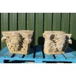 A set of four carved sandstone corbels `the four seasons' two of female faces and the other two male
