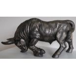 Composition bronze model of a charging Spanish bull (67cm x 33cm)