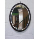 Small Chippendale style mahogany framed and an oval bevel edged mirror in moulded mahogany framed (