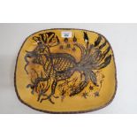 Slipware style shaped rectangular dish, decorated to centre with a study of a cockerel, mark WJ (