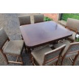 1930's oak extending draw leaf table on carved bulbous supports, and a set of six dining chairs with