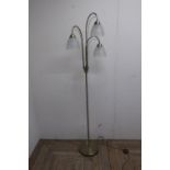 Brushed gilt finish modern standard lamp with three opaque glass shades and floor switch (height