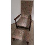 Walnut framed broad seated open armchair with modern upholstered seat and back on turned supports,