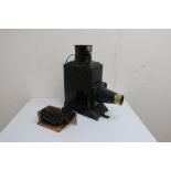 Magic lantern in black Jappaned case, brass lens, wooden slide carrier etc, now converted to