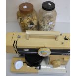 Riccar model 690 electric sewing machine and a large quantity of undyed 1940-60's buttons