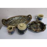 Studio potter: Chris Geal, two spongeware style decorated oval dishes, and three fish decorated